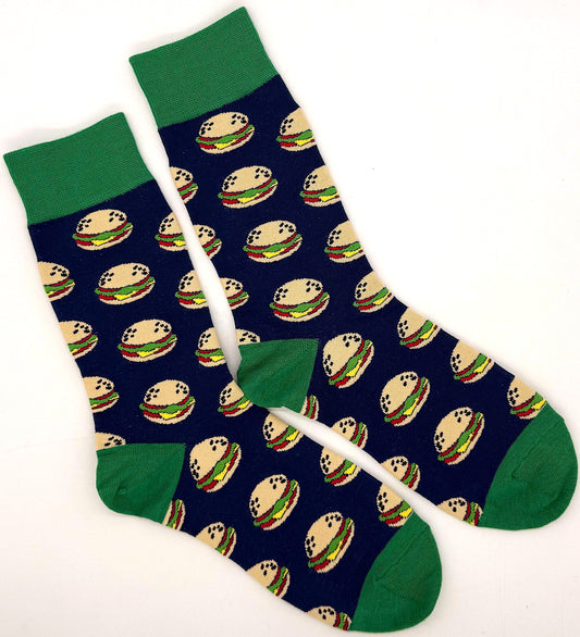 Navy blue socks with hamburger pattern and green accents on a white background