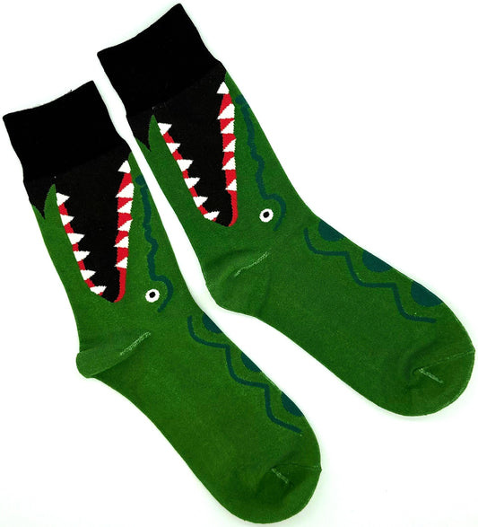 Green socks with shark mouth design on a white background