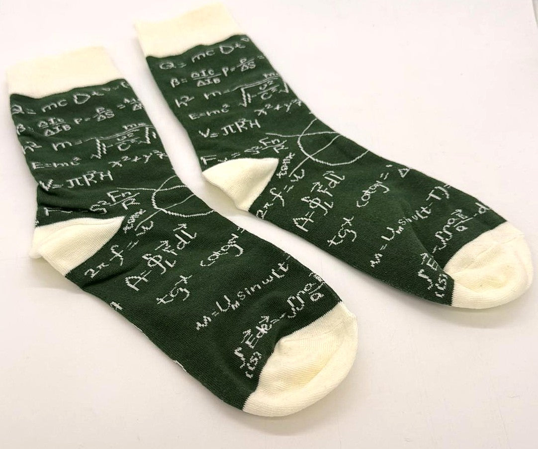 Green socks with mathematical equations on a white background