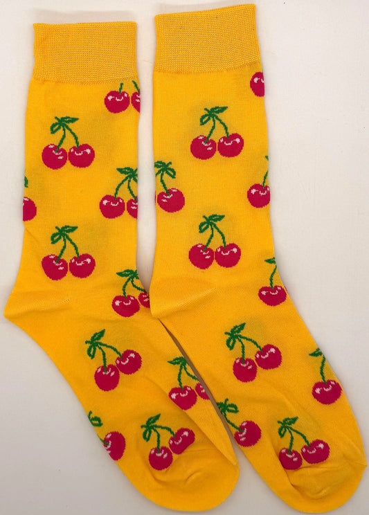 Yellow socks with cherry pattern on a white background